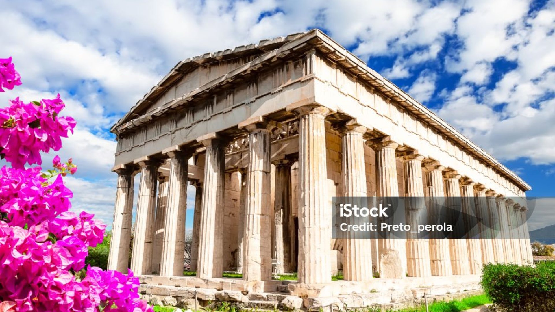 Temple of Hephaestus in Athens, Greece. Sunny view of Ancient Greek ruins in the Athens center. The Famous Hephaestus temple on the Agora in Athens, the capital of Greece.